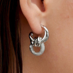 RSNY geometric abstract winding stud earrings - RSNY R2186A 铜镀铑/银耳针 约24*16*9mm 钻石纹链条元素/交错环几何造型/轻量化品牌工艺/微厚重精巧质感